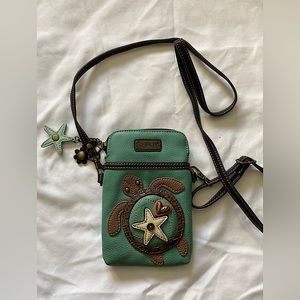 NWOT Chala crossbody bag. Leather with turtle design. Excellent condition.